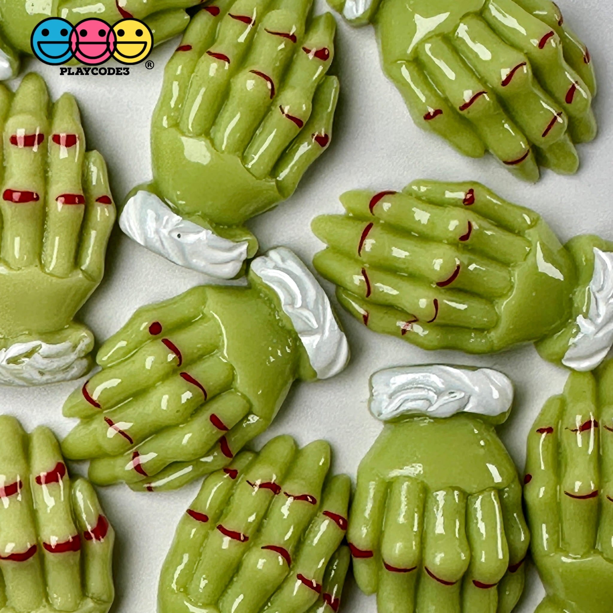 green-zombie-hands-charm-