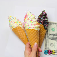 Fake ice cream cones in three flavors with a scale reference