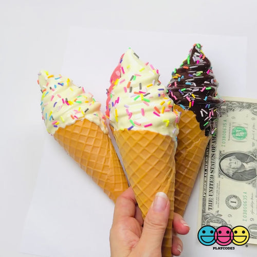 Fake ice cream cones in three flavors with a scale reference